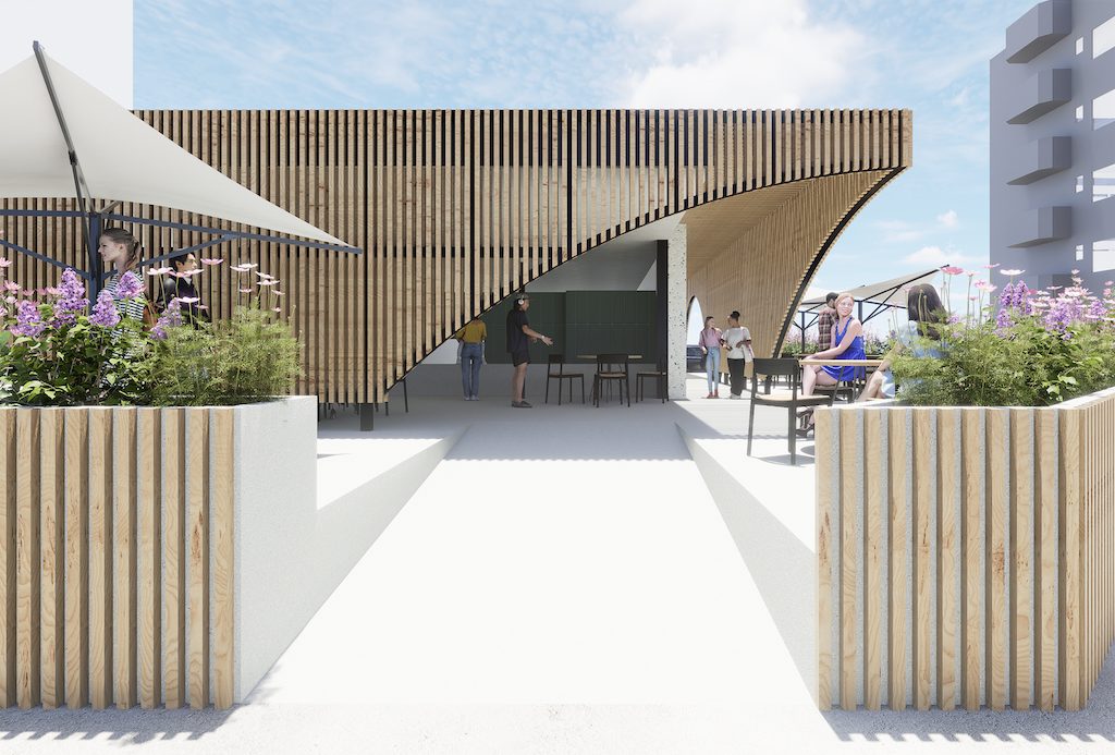 Acceso al restaurante con celosías curvas de madera