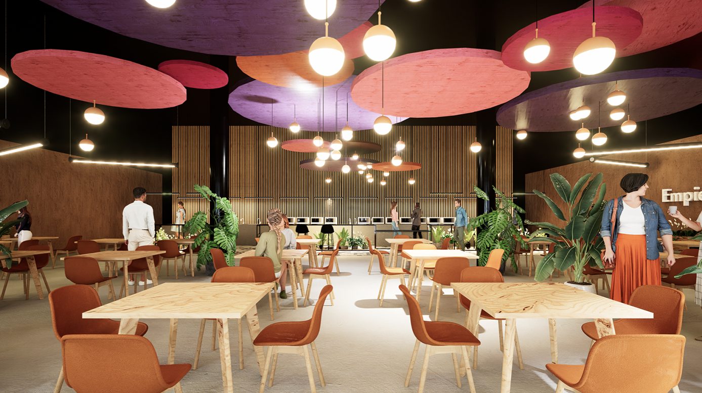 Comedor corporativo con discos acústicos de colores en el cielo